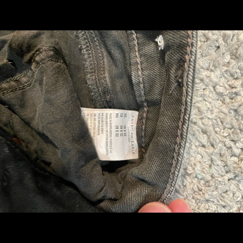 Distressed black jeans 28x32